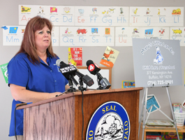 Mary Goodwill, owner of Mary's Little Lambs, during her ribbon cutting celebration on July 14, 2017