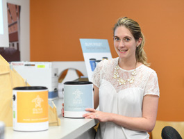 Sarah Battaglia, Sarah Battaglia, founder and CEO of Olive Ridley recycled paint company, gives a demonstration at BHNT Architects, P.C. in Buffalo, New York. Photo: Nancy J. Parisi